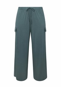 Teal vida byxor i mjukt tyg. Har elastisk midja med dragsko och två cargofickor på sidorna. Slät textur.