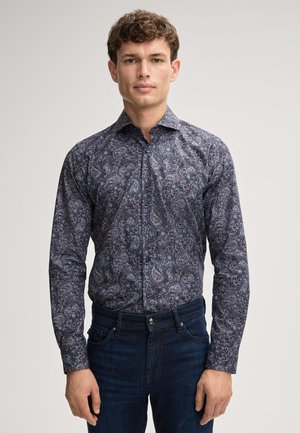 Langarmhemd in Navy mit Paisleymuster, aus leichtem Stoff gefertigt. Verfügt über eine durchgehende Knopfleiste und einen klassischen Kragen.