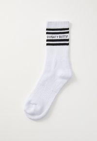 VARSITY SLOGAN - Sports socks - white/black