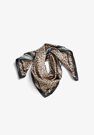 Foulard en soie à imprimé léopard avec des bordures noires, plié négligemment sur fond blanc.