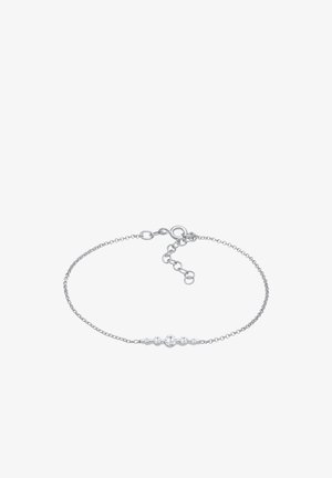 Strieborný reťazový náramok s radom piatich priehľadných drahých kameňov, s klipom vo forme homára a nastaviteľnou dĺžkou pre prispôsobené nosenie.