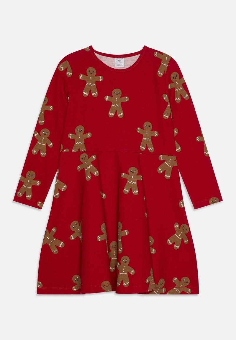 Robe rouge à manches longues avec jupe évasée, ornée de motifs de bonshommes en pain d'épice bruns souriants décorés de glaçage blanc.