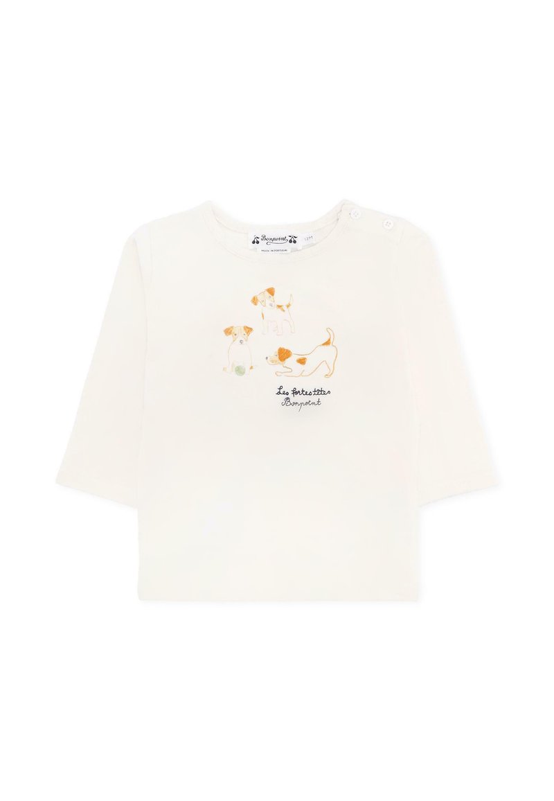 Jasna kremowa koszula z długim rękawem z bawełny, z trzema ilustracjami psów w kolorze brązowym i pomarańczowym oraz napisem "Les Petites Babanes" poniżej.