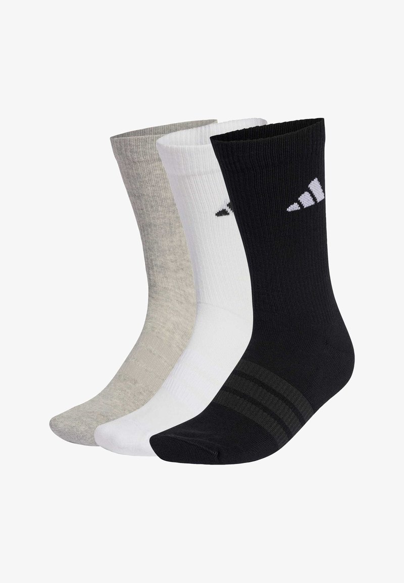 Tres pares de calcetines en gris, blanco y negro. Textura acanalada con el logo de Adidas en el calcetín negro y tres franjas en el puño del calcetín negro.