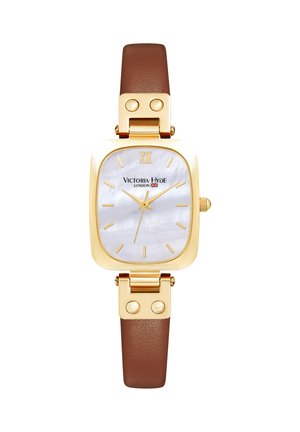 Montre rectangulaire dorée avec cadran blanc, index dorés, bracelet en cuir marron et logo "Victoria Hyde London" sur le cadran.