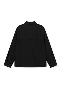 Fekete, hosszú ujjú dzseki, galléros nyakkal, hátsó vállrész részlettel és gombos mandzsettával. Egységes anyagból készült, tiszta vonalvezetésű.