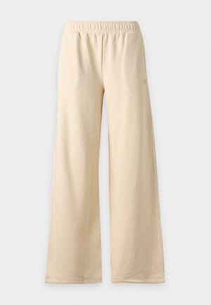 New Balance, BRUSHED COASTAL PANT - Долнище на анцуг - beige