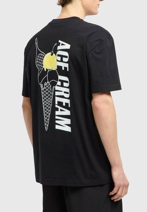 T-shirt con stampa - black