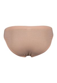 Béžové bavlněné spodní prádlo s měkkou strukturou, s nízkým pasem, bezšvovými okraji a hladkým zakončením vzadu, bez ozdob.