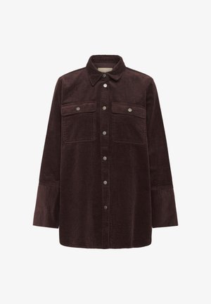 Dunkelbraune Cordjacke mit Druckknöpfen an der Vorderseite, zwei Brusttaschen mit Klappen und langen Ärmeln mit breiten Manschetten.
