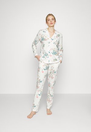 Floral print pajama set made of soft fabric, featuring a button-up top with collar and long sleeves, and matching pants with an elastic waistband.