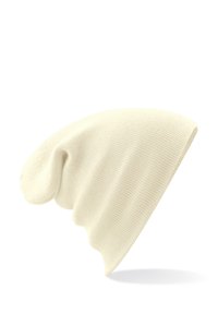Cream-colored beanie hat made of ribbed knit fabric. Soft texture with a slouched design, tapering at the ends. No visible logos or hardware.
