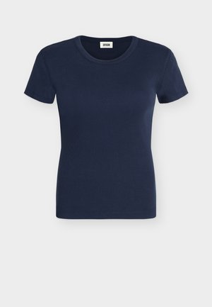 T-shirt côtelé en coton bleu marine à manches courtes, col rond et coupe ajustée.