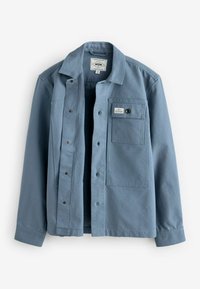 Light blue button-up shirt jacket with collar, front flap pocket with button, and visible brand label inside the collar.