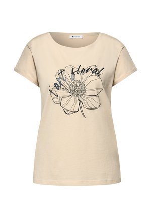 Maglietta beige a maniche corte con un grande fiore contornato di nero e testo in corsivo "stay floral" sul davanti.