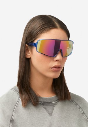 Blue oversized sunglasses with gradient reflective lenses featuring pink, yellow, and green hues. Sleek design with angular shape.