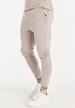 Spodnie treningowe - washed pink