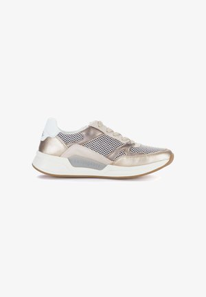 Light gold and beige sneaker with mesh panels, white padded heel collar, lace-up front, and cushioned sole labeled "rollingsoft."