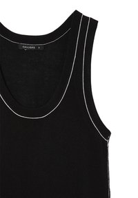 Top nero senza maniche con scollatura arrotondata e cuciture bianche a contrasto lungo i bordi. Realizzato in un morbido tessuto a maglia testurizzata.