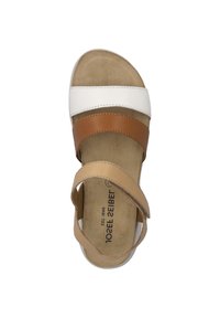 Brown, tan, and white leather sandal with two adjustable straps, a cushioned insole, and a smooth, flat sole.