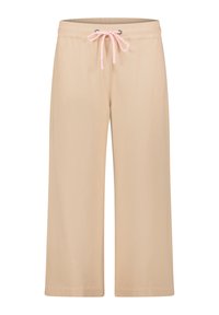 Beige wijde pijpen broek van zacht stof, voorzien van een trekkoord in de taille met zilveren eyelets en een roze gevlochten koord.
