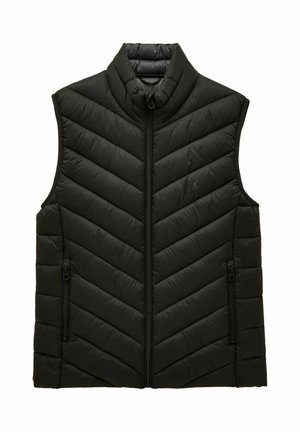 Mustat vuoratut ilmanhihoilla oleva liivi, jossa on korkea kaulus, etuvetoketju ja vetoketjulliset sivutaskut. Liivissä on myös chevron-ommelkuvio.