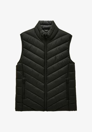 Czarna pikowana kamizelka bez rękawów z wysokim kołnierzem, zamek błyskawiczny na przedzie oraz zamykanymi kieszeniami po bokach, z charakterystycznym wzorem haftu w zygzak.