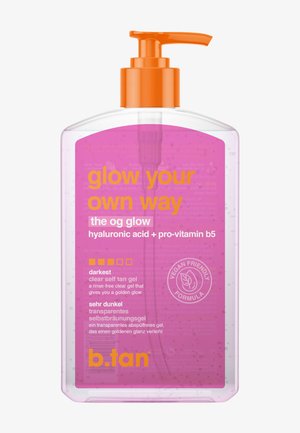 Clear bottle of pink b.tan self-tan gel with orange pump, labeled "glow your own way," vegan-friendly, hyaluronic acid, pro-vitamin B5, darkest shade.
