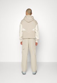 adidas Originals ESSENTIALS - Pantaloni cargo - beige