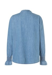 Hellblaue Denim-Bluse mit langen Ärmeln. Verfügt über ein gerafftes Manschettendetail und einen Rüschenausschnitt. Weicher, strukturierten Stoff, lässiger Stil.