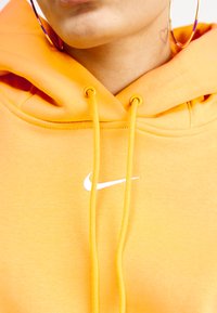 Nike Sportswear SPORTSWEAR PHOENIX FLEECE - Sportinis megztinis - sundial/sail