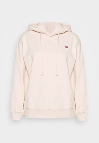 Sudadera con capucha de un suave tejido en color rosa claro. Presenta un bolsillo frontal y capucha con cordones, con un pequeño logo rojo en el pecho.