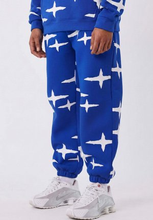 BAS DE JOGGING ALL OVER POLARIS BRUSH - Pantaloni sportivi - bleu outremer profond