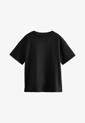 T-shirt noir uni à manches courtes et col rond, posé à plat, avec col côtelé et coupe régulière sur fond blanc.