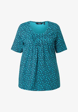 Blouse turquoise à manches courtes avec motif floral noir et détail plissé à l'avant, dotée d'un col rond.