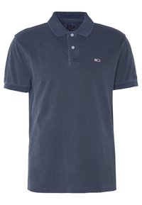 Polo blu marin made di cotone strutturato, con colletto, patta con due bottoni e piccolo logo sul petto.