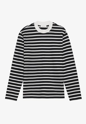 Jersey de manga larga con rayas horizontales en blanco y negro, escote redondo y puños acanalados. Tejido suave con un corte clásico.