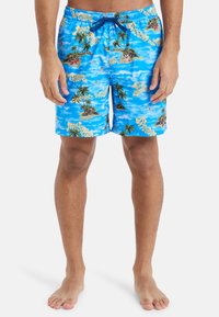 Modré plavky s potlačou palm a ostrov. Majú elastický pás s šnúrkou a ľahký, hladký povrch.