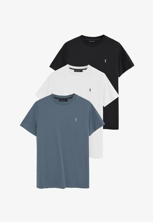 Tre t-shirt Polo Club girocollo in nero, bianco e blu, ciascuna con un piccolo logo ricamato di un giocatore di golf sul petto.