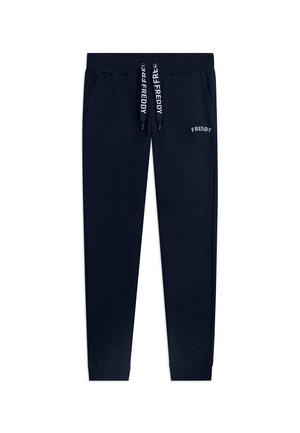 Pantalon de jogging bleu marine avec taille élastique, cordons portant la mention "FREDDY", poches latérales et logo "FREDDY" sur la cuisse gauche.