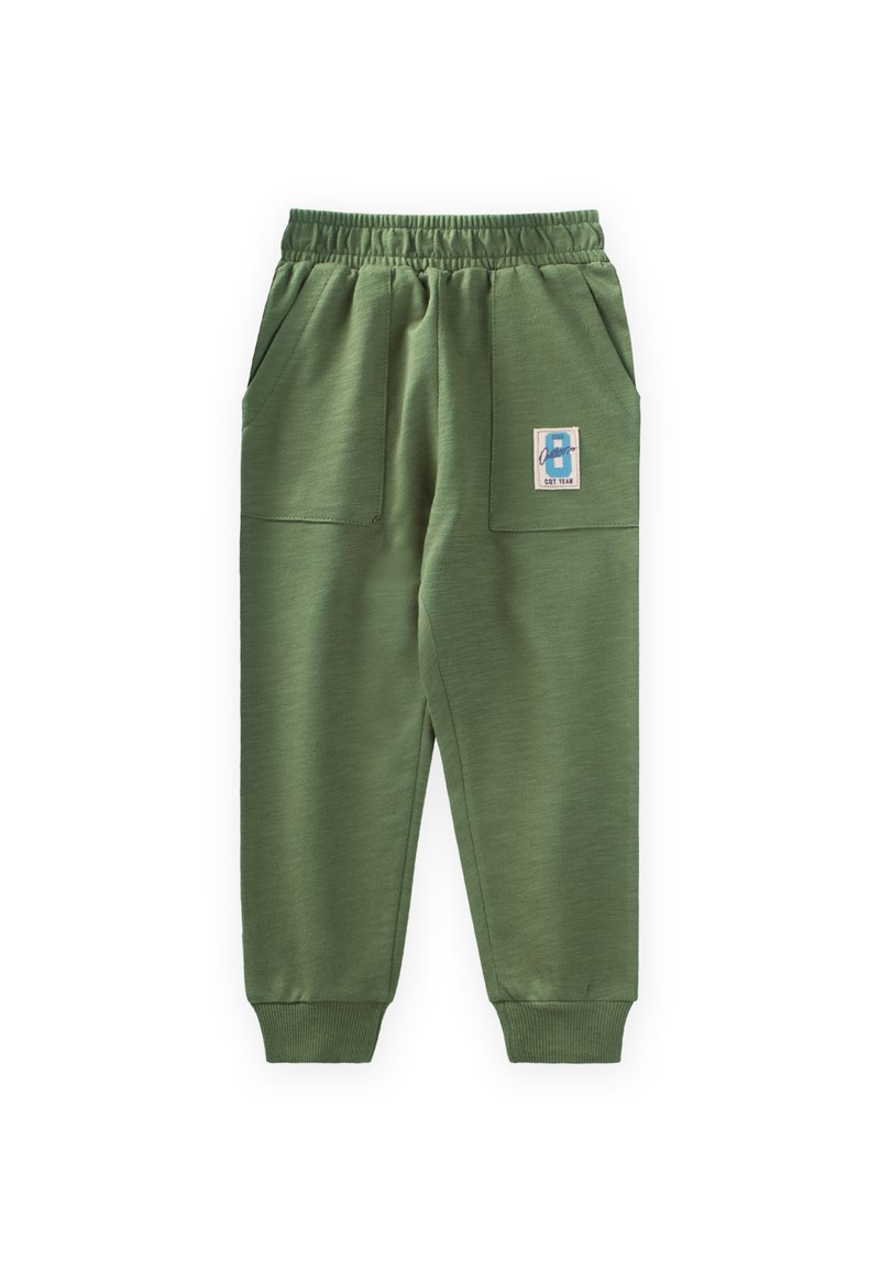 Grüne Sweatpants aus weichem Stoff verfügen über einen elastischen Bund, gerippte Bündchen und zwei Vorderaschen, mit einem kleinen blauen Logopatch.