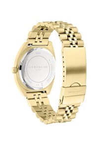 Gouden roestvrijstalen horloge met een mesh armband en een ronde kast. Heeft een gepolijste achterkant met merkgravure en details over waterbestendigheid.