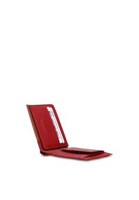 Red leather wallet with a snap closure, card slot showing a white card, and a soft, textured finish. Compact design with polished edges.
