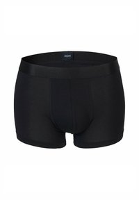 Boxer da uomo neri realizzati in tessuto elasticizzato, con una cintura liscia, una parte anteriore senza cuciture e un design aderente.