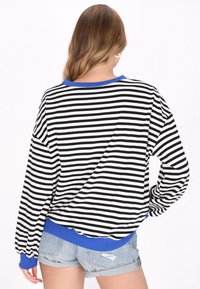 myMo Melegítőfelső - black stripes