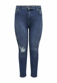 Jeans skinny de color azul oscuro, confeccionados en denim, que presentan detalles desgastados y bordes deshilachados. Diseño clásico de cinco bolsillos con cierre de botón.