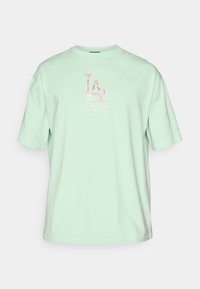 Mint green cotton t-shirt with a round neck, short sleeves, and a central multicolored "LA" logo design. Soft texture, relaxed fit.