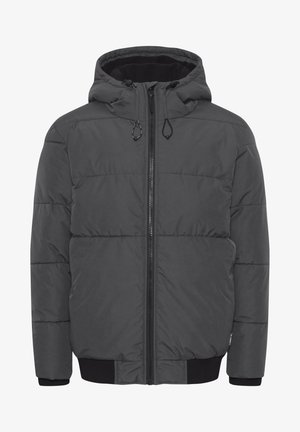 Tumehall puffer-jakk, millel on lukuga kinnitamine, reguleeritav kapuuts, soonikkoes mansetid ja horisontaalne õmblustäidis. Pehme, isolatsioonimaterjal.