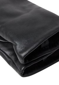 Black leather clutch with a smooth texture, featuring a fold-over design. The edges are slightly rounded, with no visible hardware or accents.