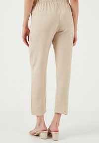 LELA REGULAR FIT - Hlače - beige